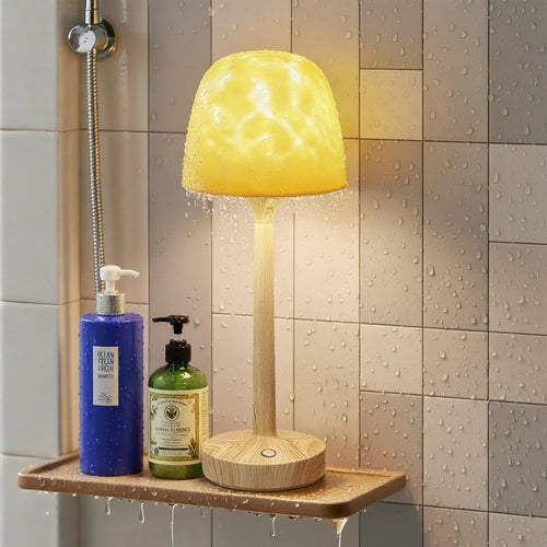 Water-resistant shower lamp with wooden base on shower shelf with shampoo bottles